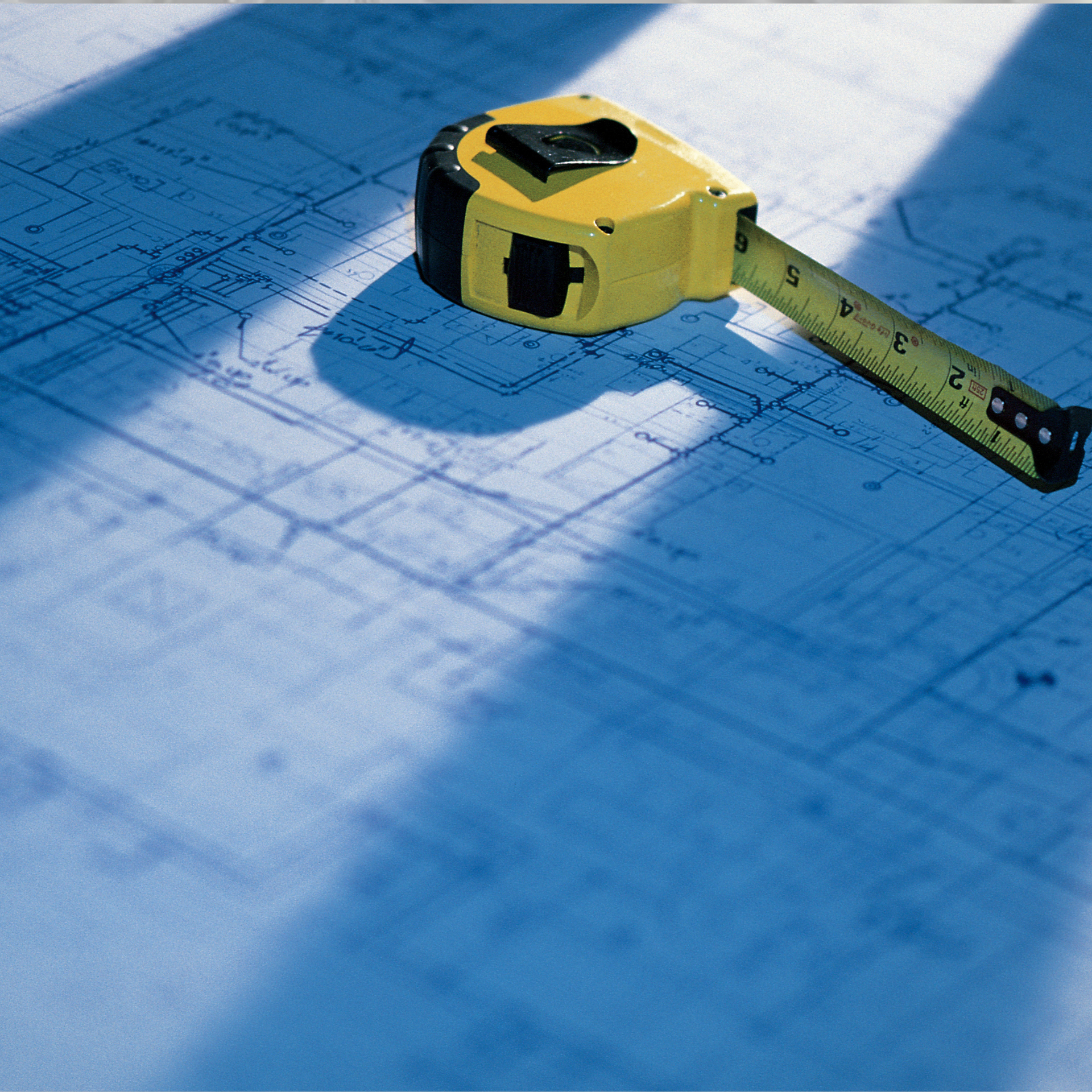 blueprints-with-tape-measure