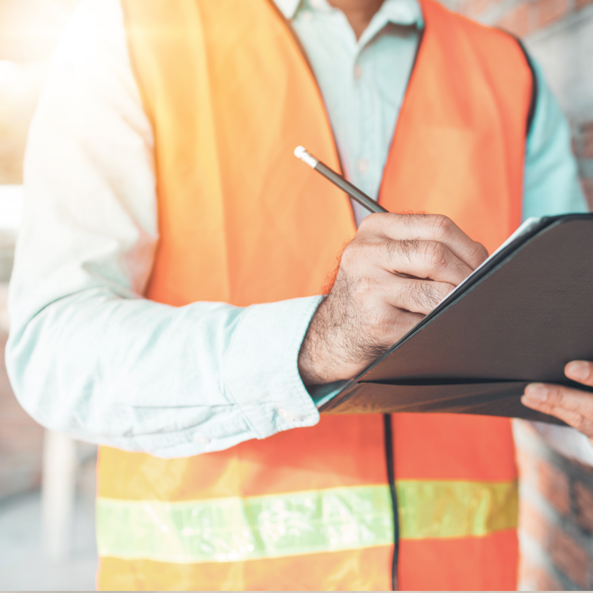Team member performing stock check at Tasman Group warehouse location
